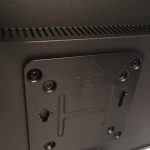 Intel nuc vesa plate on the back of a monitor