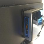 Intel nuc mounted on the back of a monitor